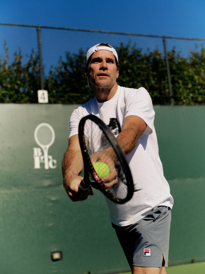 On the bench with Tommy Haas.